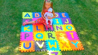 ABC  Yaroslava finds letters on the Playground  Video for kids [upl. by Oirevlis]